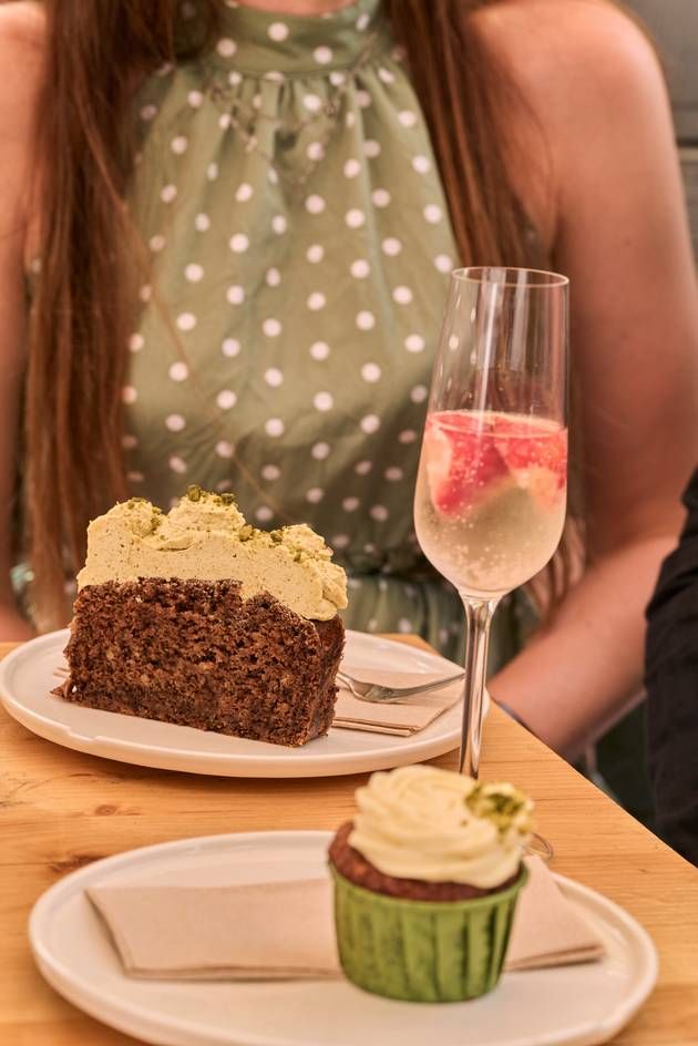 Assorted desserts served on plates with a champagne glass.